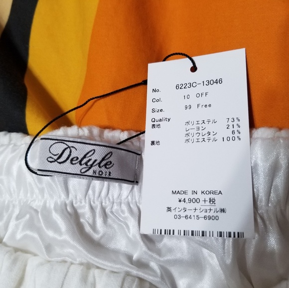 Elegant Asymmetric Pencil Skirt from Delyle - Picture 3 of 4